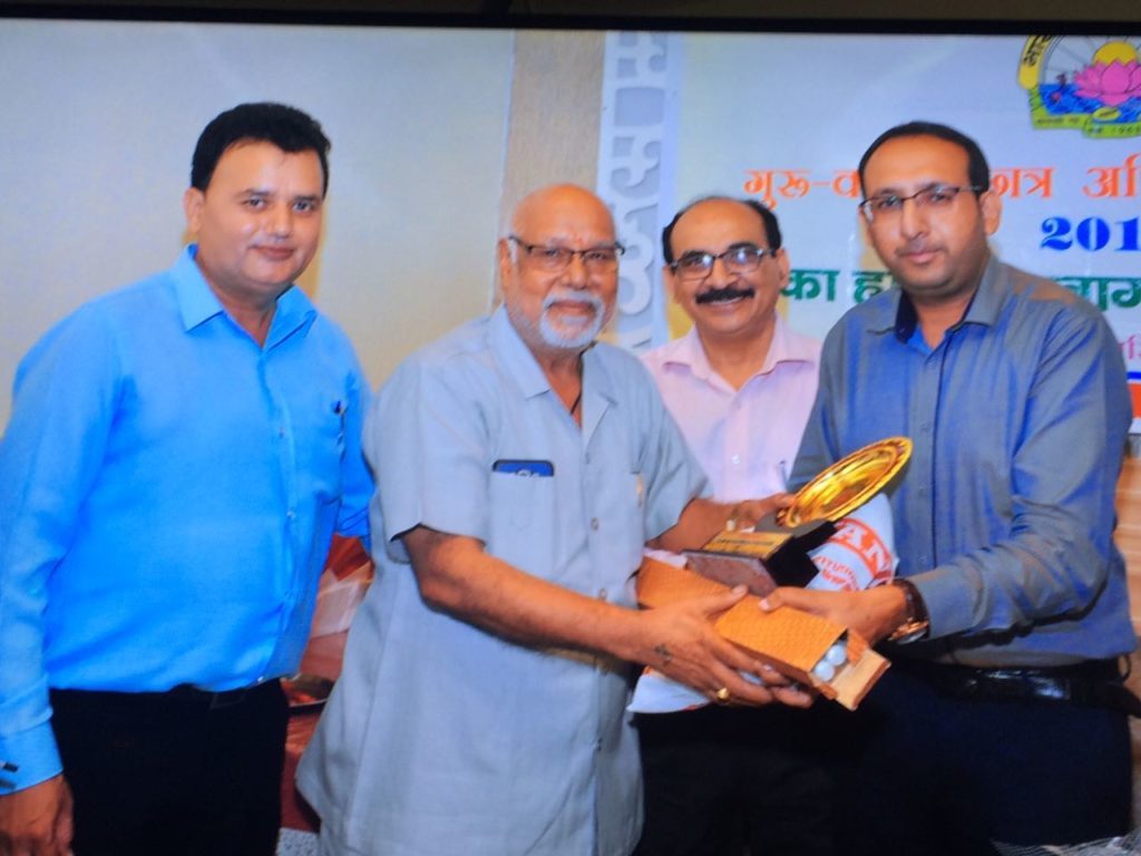 Respected Principal Dr.k.C Sharma being honored